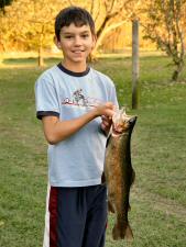 Julian with 2006's record 21 inch Rainbow.